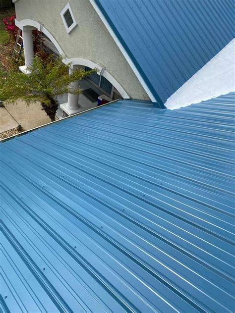 navy blue house with metal roof|ocean blue metal roofing panels.